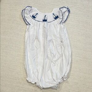 White Smocked Bubble Romper with Blue Sailboat Design